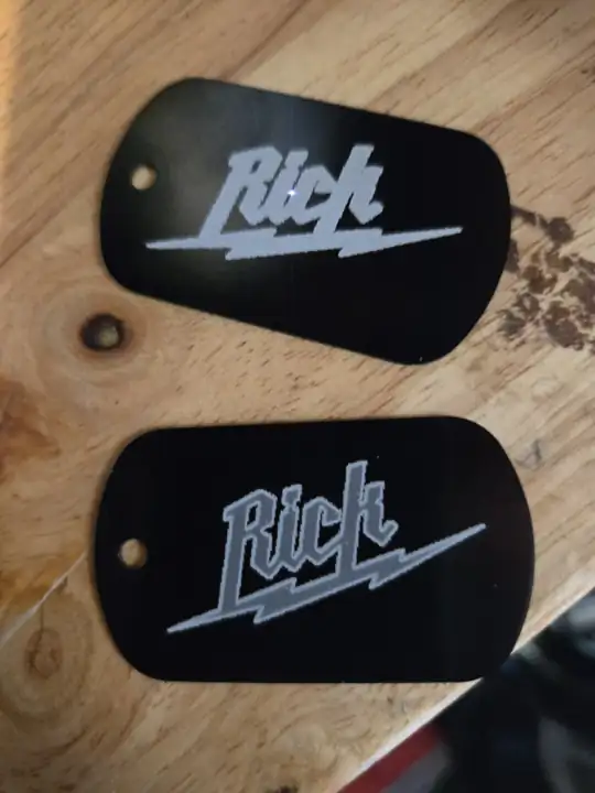Rick's logo engraved on tags