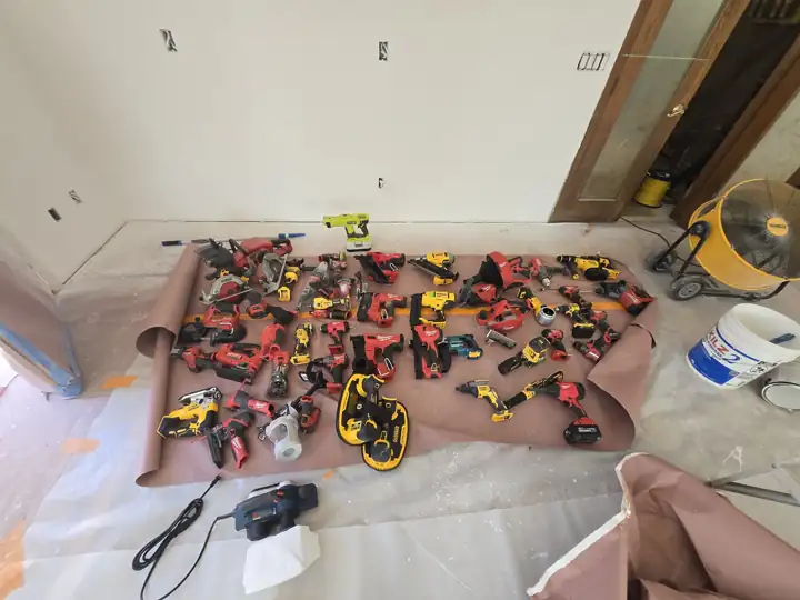 Every tool laid out before the wall went up